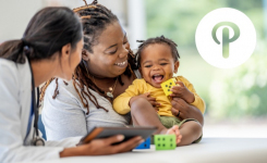 Physician with Happy Mum and Infant