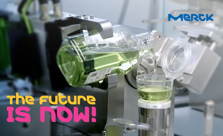 A robotic arm pours media onto a filter in a pharmaceutical production environment